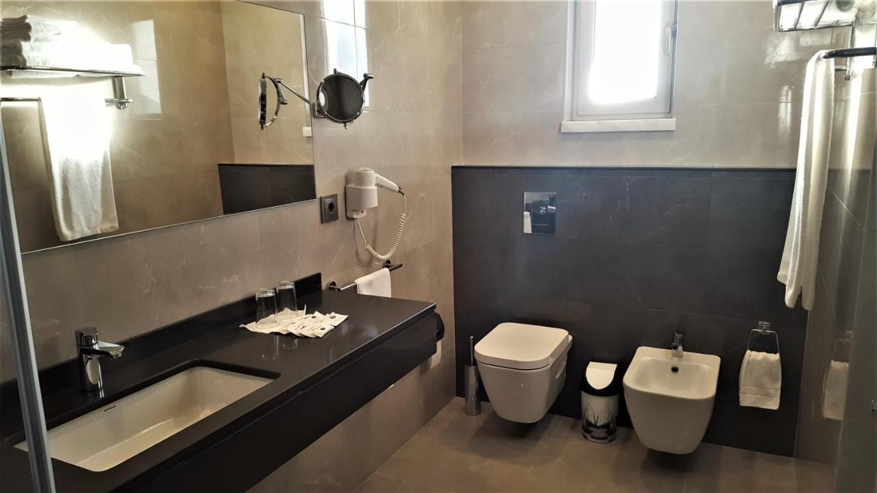 Deluxe Triple Room with Terrace and Sanctuary View