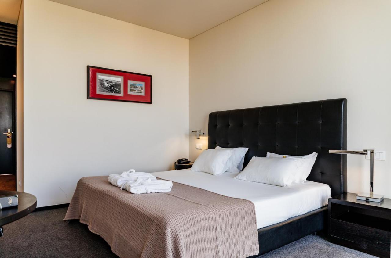 Habitación Doble con 1 cama doble o 2 camas individuales y paquete de masaje