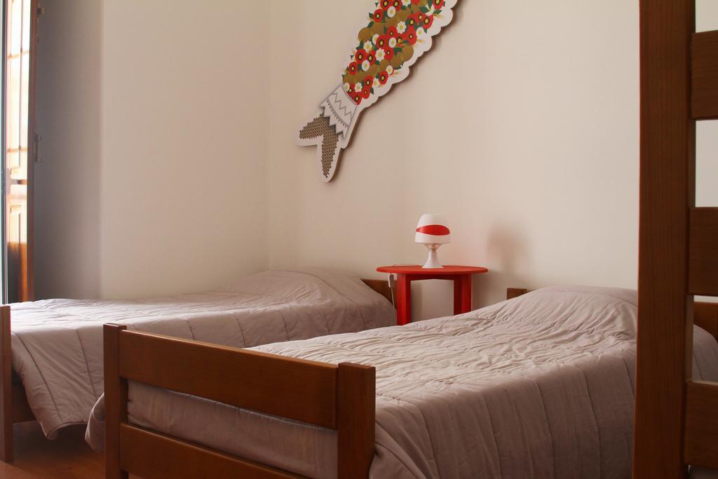 Quarto Quádruplo com Varanda
