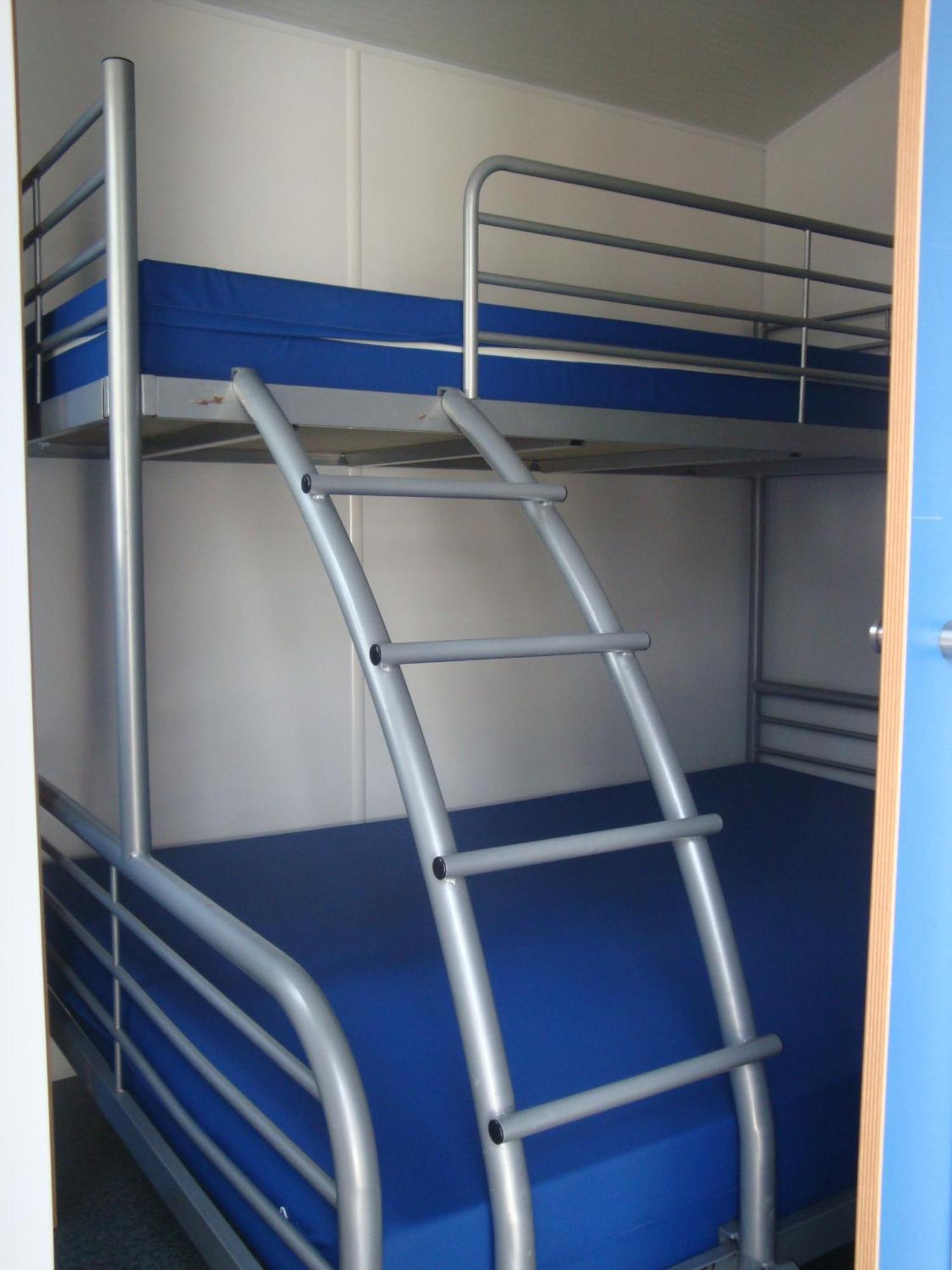 Caravan with shared bathroom