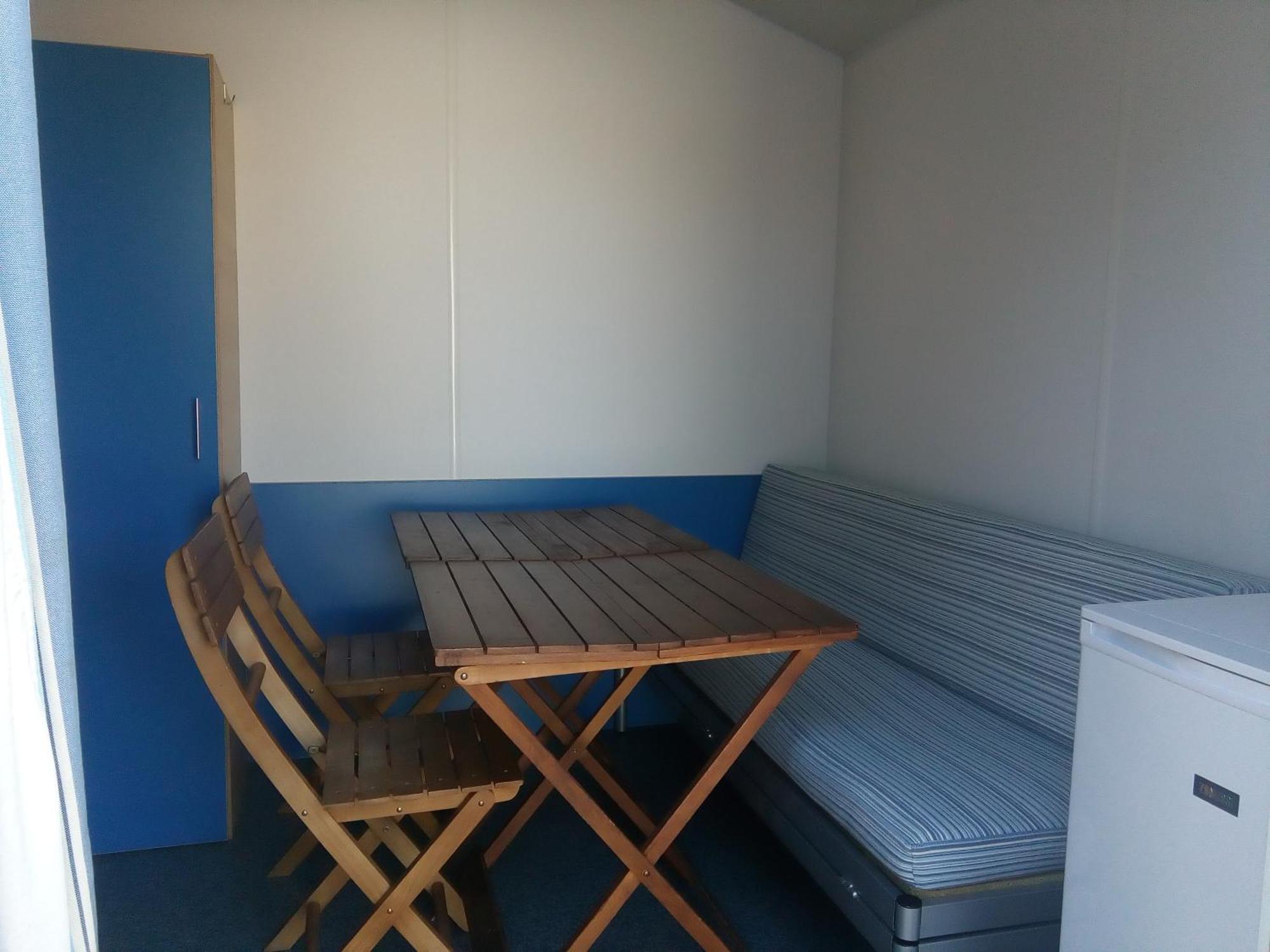 Caravan with shared bathroom