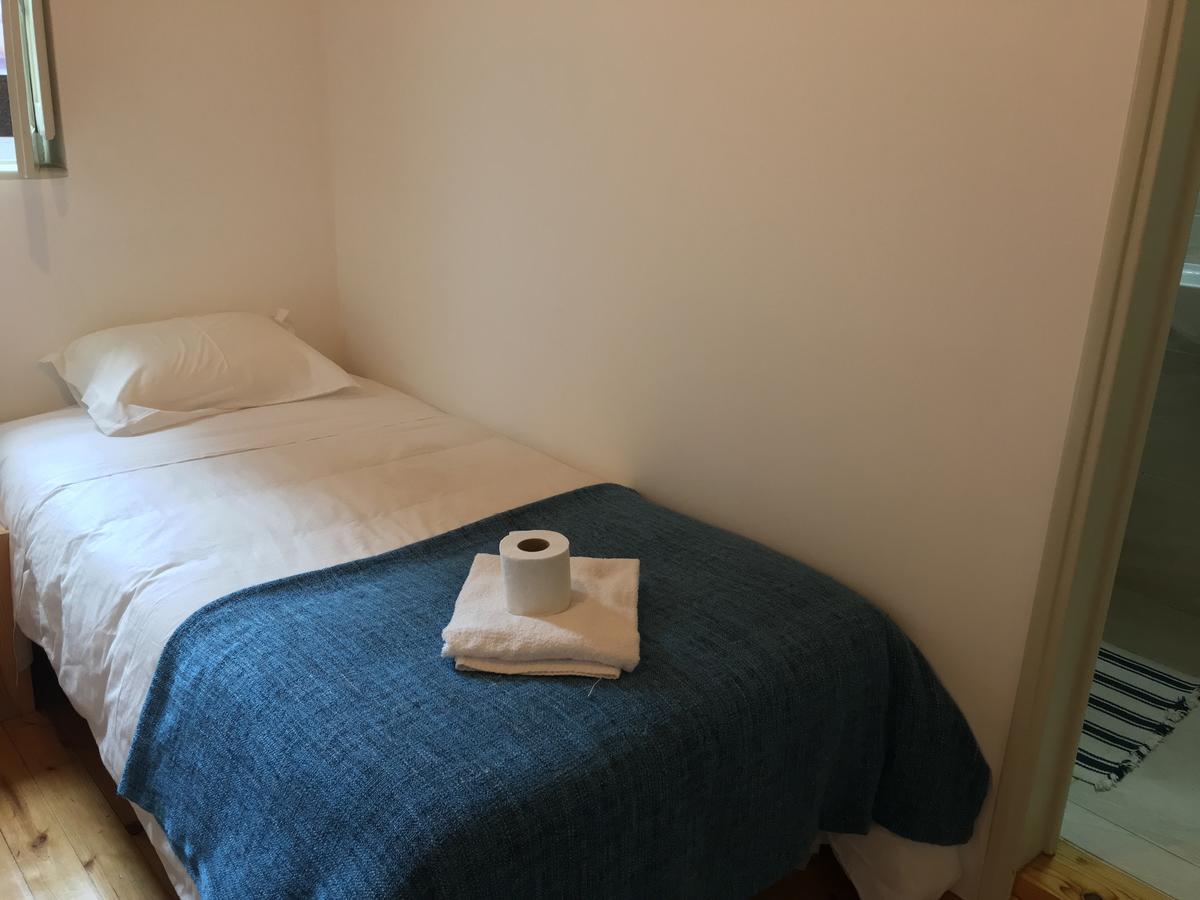 Quarto Individual com Casa de Banho Privativa