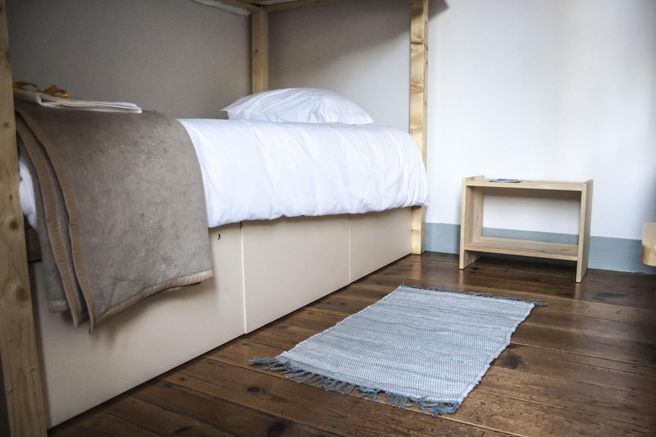 Quarto Individual com Casa de Banho Partilhada
