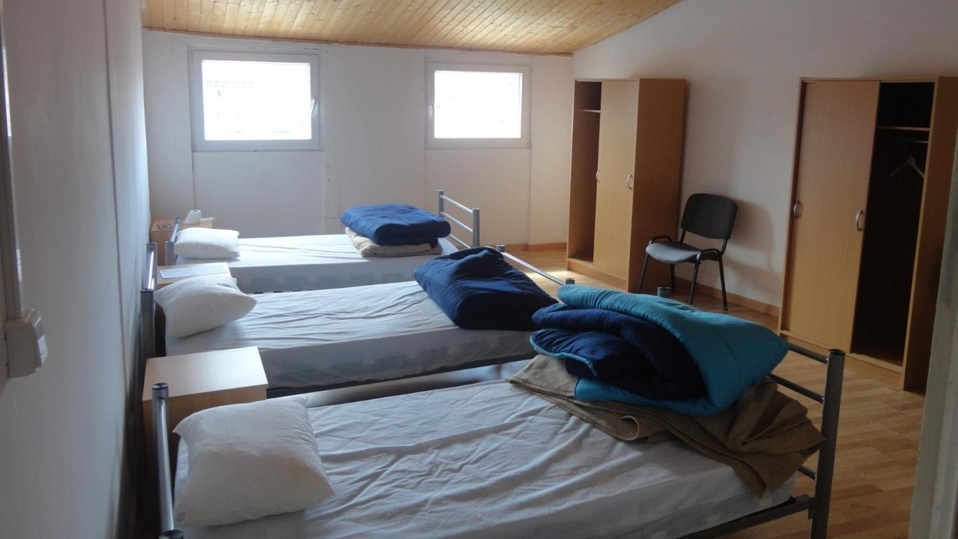 Quarto Triplo com Casa de Banho Partilhada