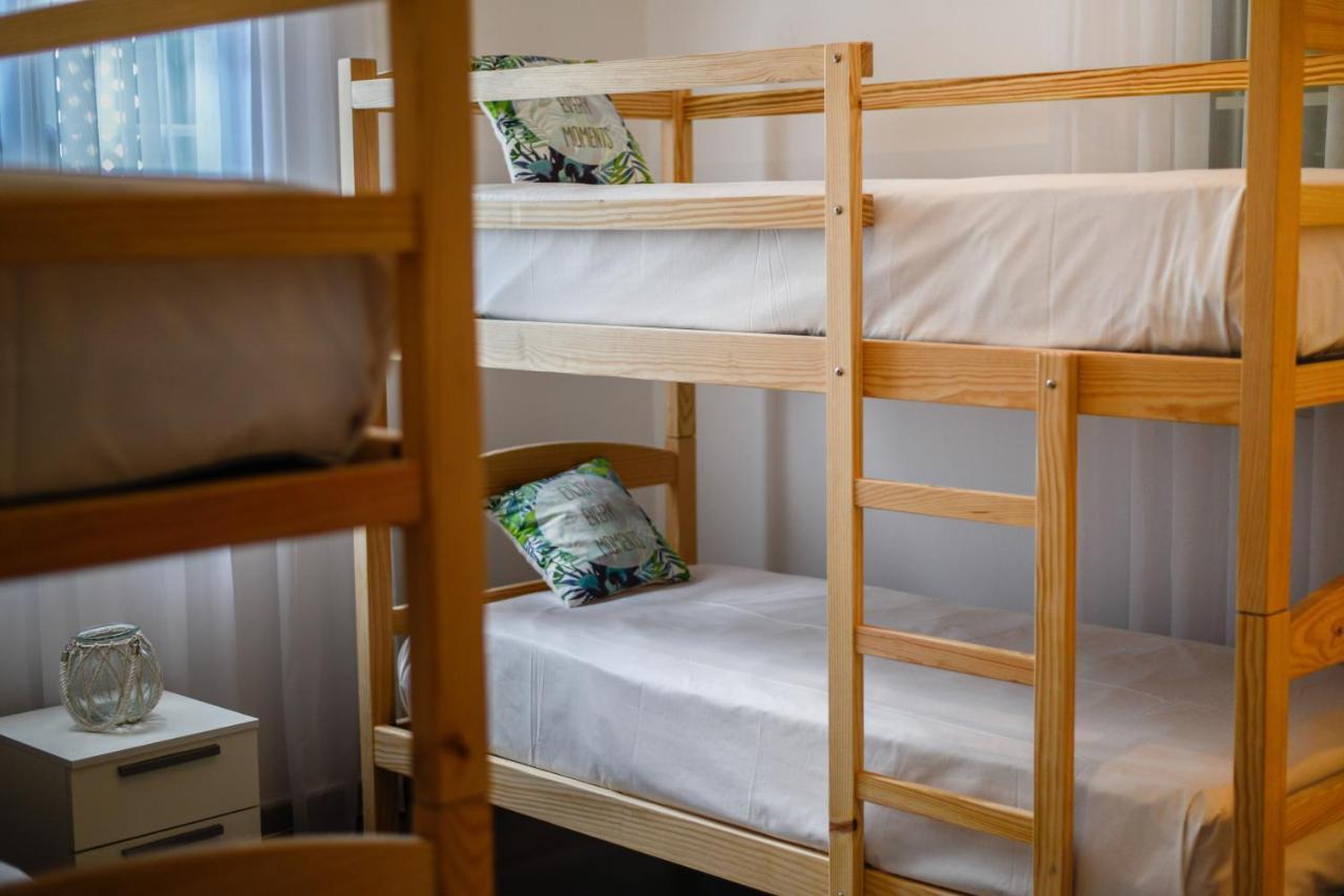 Quarto Quádruplo com Casa de Banho Partilhada